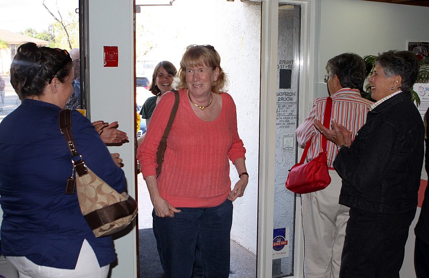 Dr. Janet Whitlock was surprised by all the people who were in the  hospital to greet her and wish her a happy birthday and congratulate her on 30 years as a veterinarian at Beneva Animal Hospital.