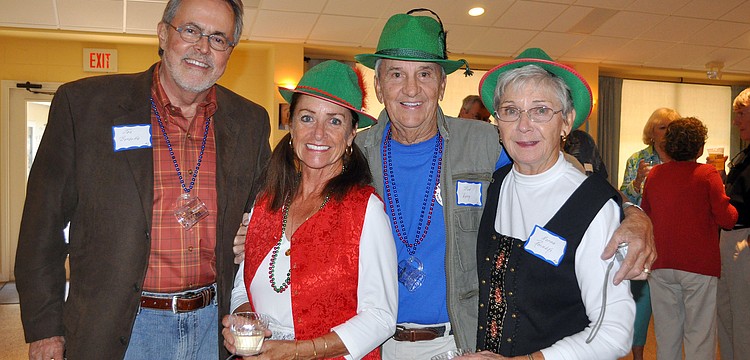 Commissioner Joe Barbetta poses with Linda and Bob Long and Norma Roembke Friday, Oct. 21, at St. Boniface's.