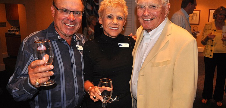 Jim and Jean Zakovec pose with Bill Steele, Saturday, Oct. 22 at Bird Key Yacht Club.