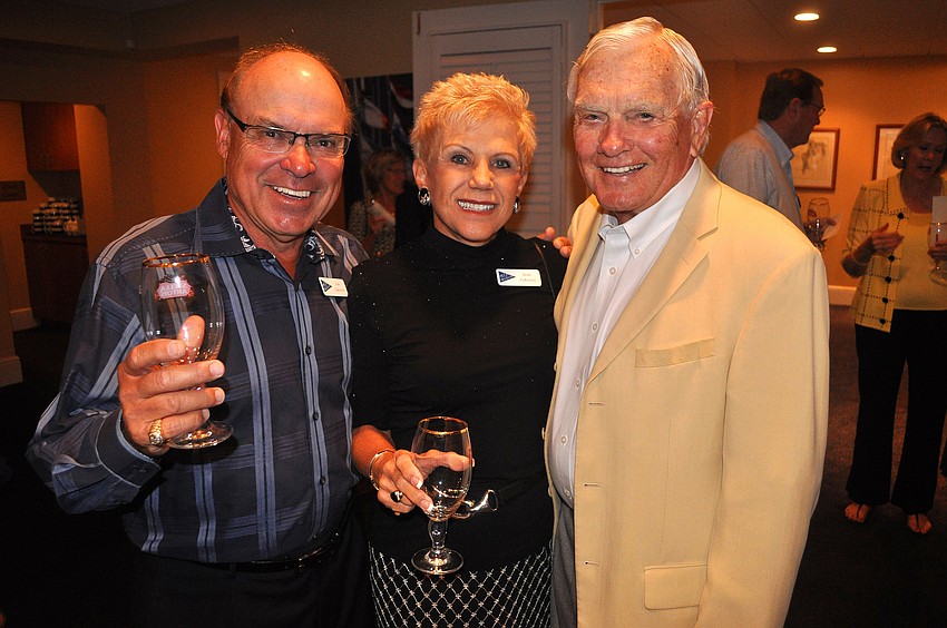 Jim and Jean Zakovec pose with Bill Steele, Saturday, Oct. 22 at Bird Key Yacht Club.