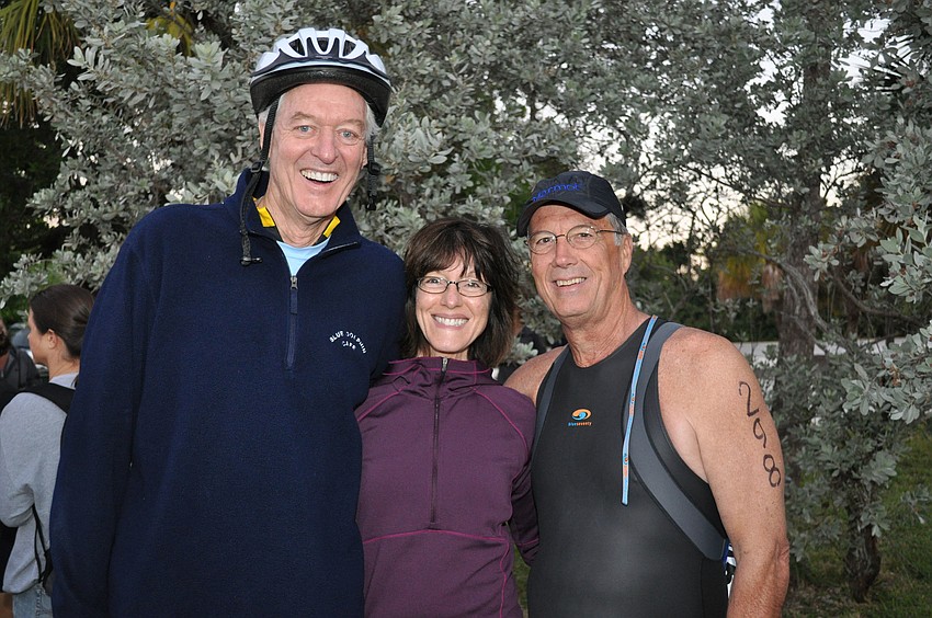 Owner of Blue Dolphin Robbie and wife Donna Ball with Longboat Key Club and Resort General Manager Michael Welly