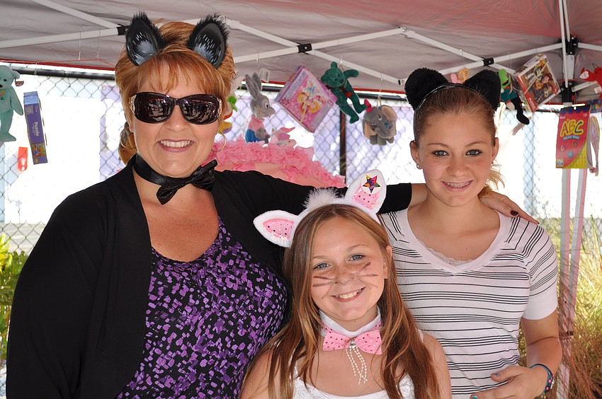 Sarah, Julia and Jodie Meyers foster kittens