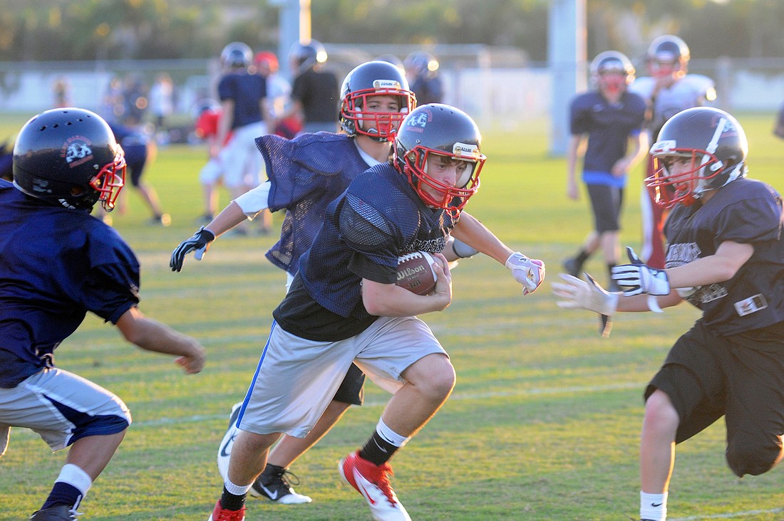 Running back Kyle Thoma scored 15 touchdowns for the East Manatee Bulldogs Junior Midgets team during the regular season. Photo by Jen Blanco.