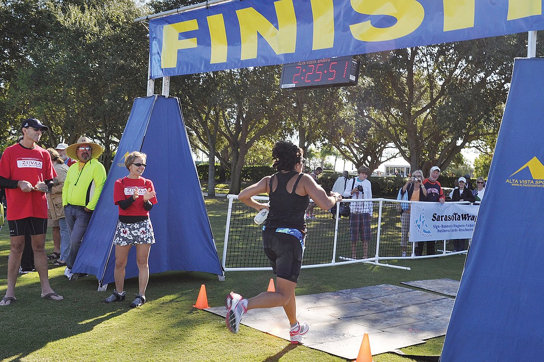 Competitors crossed the finish line at the Longboat Key Club.