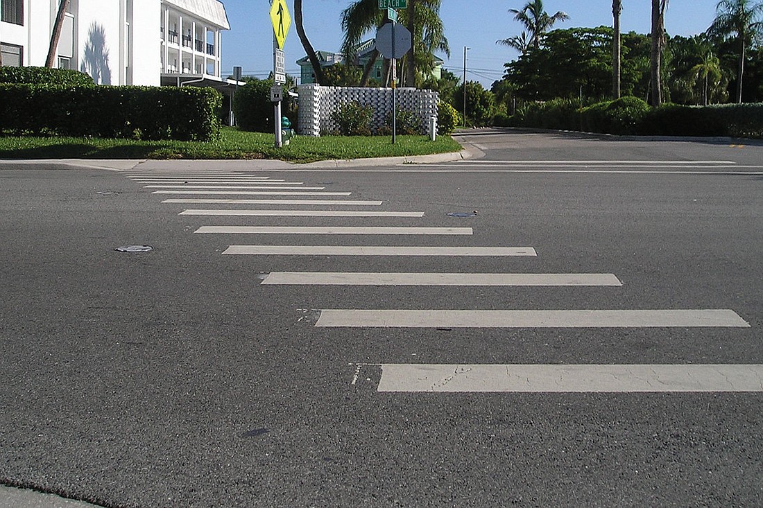Even with the crosswalk at Beach Way, pedestrians have encountered difficulty in crossing Beach Road. File photo.