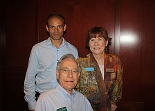 Chris Digham with Exotica Florist, Norm Mallard with Hughes Exterminators and Nancy J. Taussig with Barefoot Weddings