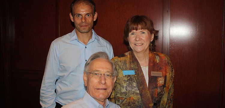 Chris Digham with Exotica Florist, Norm Mallard with Hughes Exterminators and Nancy J. Taussig with Barefoot Weddings