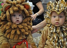 Mason Pawloski and Brycen Mohar wore cuddly lion costumes to the weekly meeting of Sarasota Memorial Hospitalâ€™s â€œMommies and Babiesâ€ group. Photo by Loren Mayo.