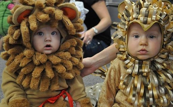 Mason Pawloski and Brycen Mohar wore cuddly lion costumes to the weekly meeting of Sarasota Memorial Hospitalâ€™s â€œMommies and Babiesâ€ group. Photo by Loren Mayo.