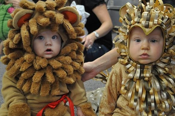 Mason Pawloski and Brycen Mohar wore cuddly lion costumes to the weekly meeting of Sarasota Memorial Hospitalâ€™s â€œMommies and Babiesâ€ group. Photo by Loren Mayo.