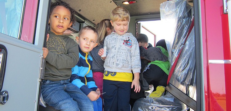 Christian Iturrino, Sean Freund, Andrew Beall checked out the fire truck.