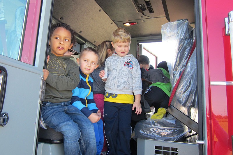 Christian Iturrino, Sean Freund, Andrew Beall checked out the fire truck.