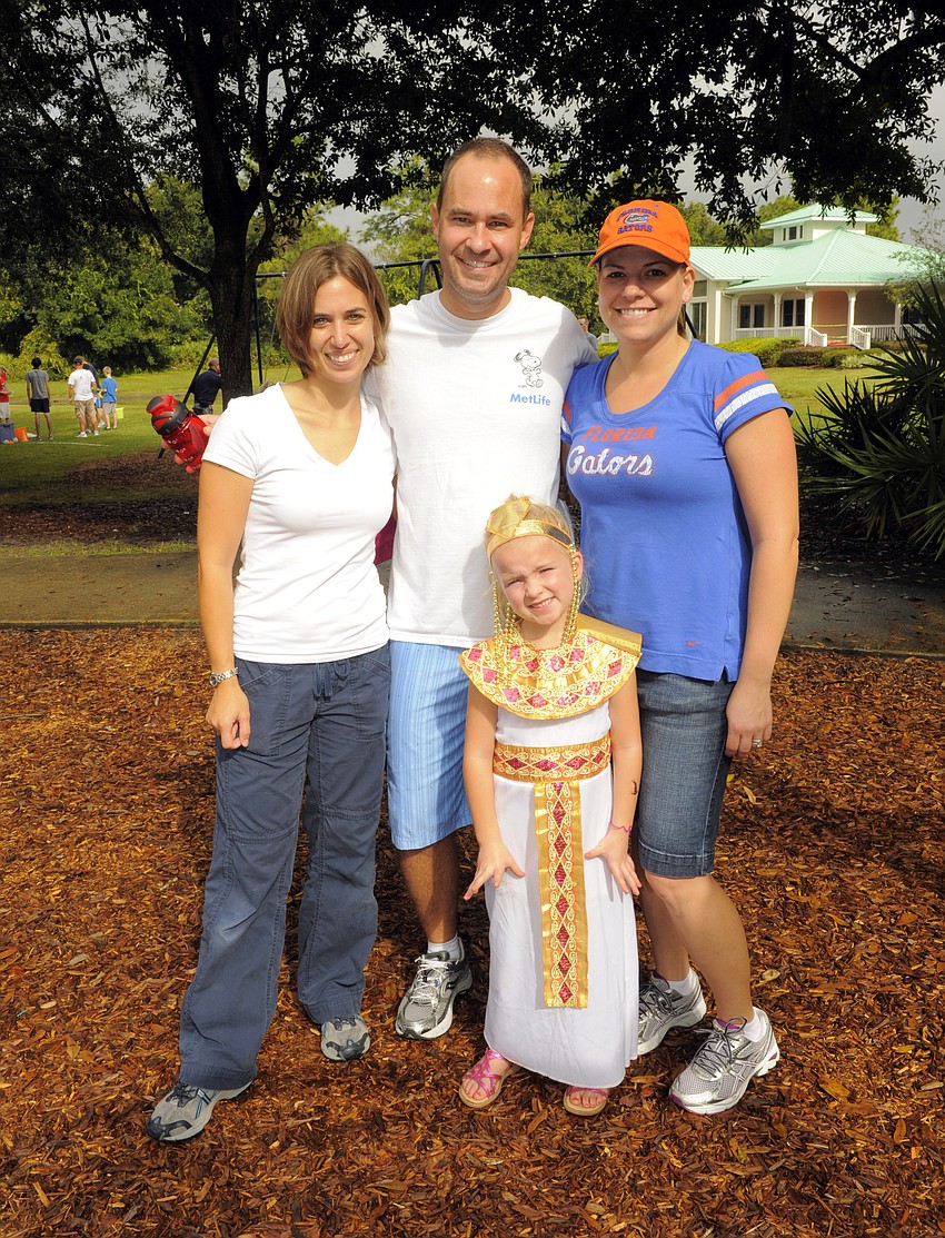 Becky and Ryan Johnson met up with Lisa Hotaling, back right, and her 6-year-old daughter Maddie.