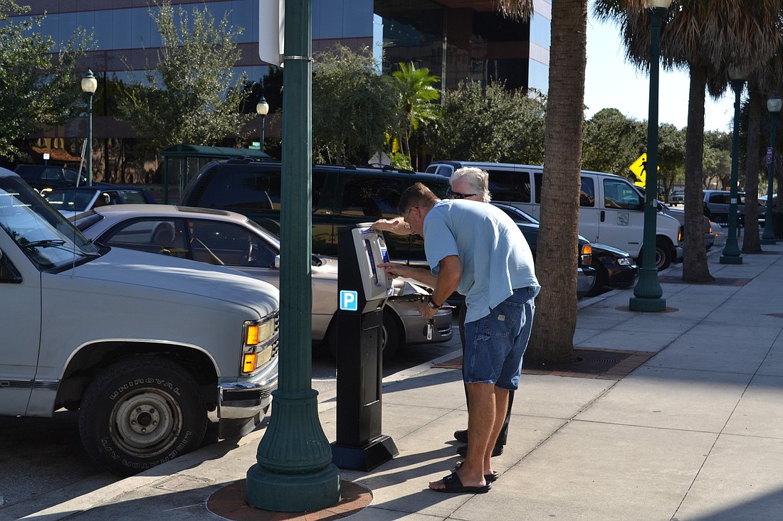 Parking meter hourly rates rise from 50 cents to $1 today. File photo.