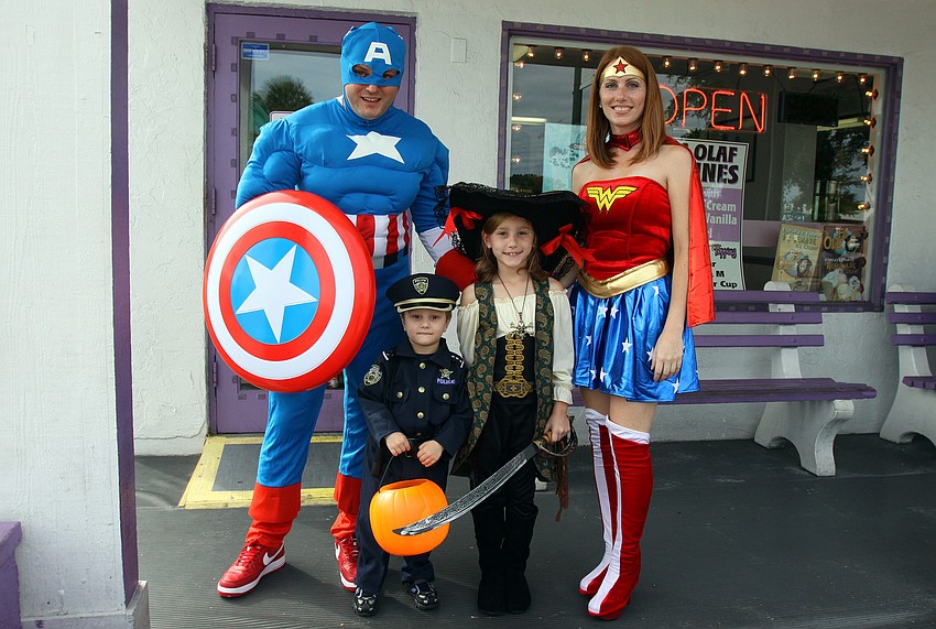 Mario, Jack, 4, Marissa, 7, and Ann Marie Govic trick-or-treated as a family throughout the Village.