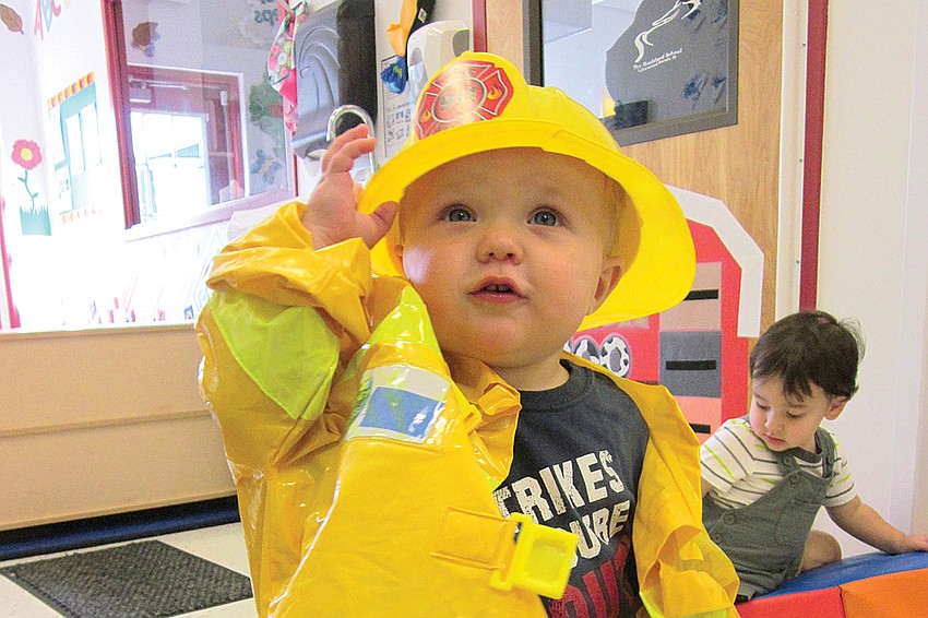 Gabe White tried on an entire firefighter outfit.