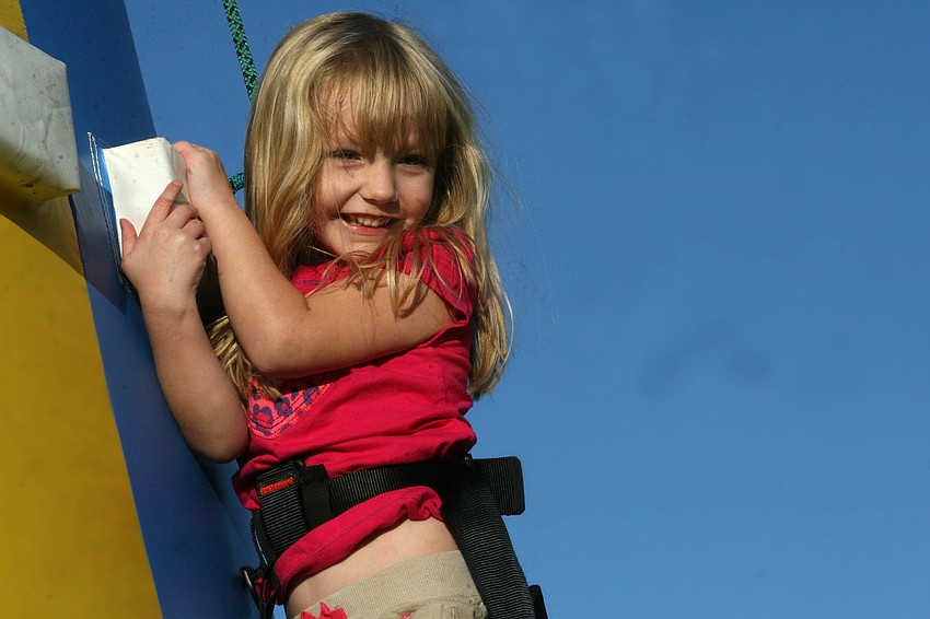 Danielle Richter, 3, braved the inflatable climbing course.
