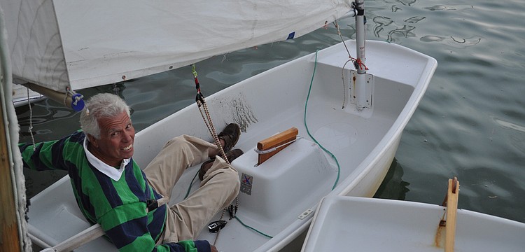 Bird Key Yacht Club Commodore Bob Baime prepares to take-off