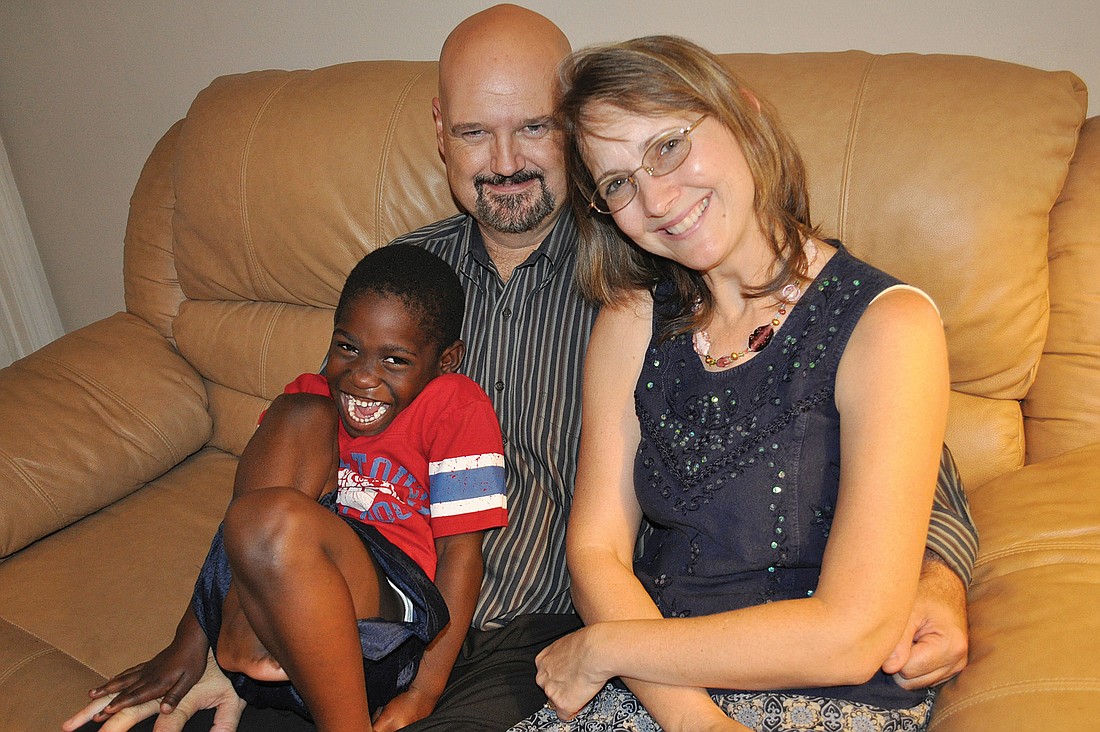Matt Vanderford, 4, has adjusted well to life with his new family. He is pictured with his adoptive parents, Scott and Cyndee Vanderford.