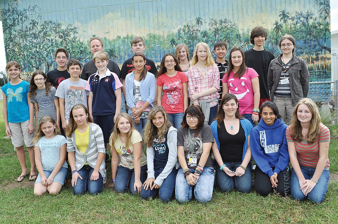 Advanced art students in Wade Smith's class worked on this Florida wetlands mural two days a week for the last six weeks. Students celebrated completion of the project Nov. 7.