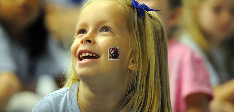 Four-year-old Jordyn Jomisko couldnâ€™t wait to show off her patriotic sticker.