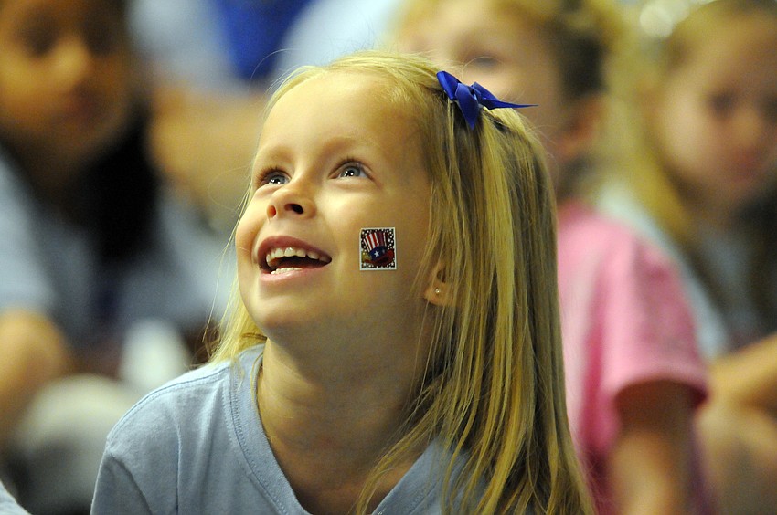 Four-year-old Jordyn Jomisko couldnâ€™t wait to show off her patriotic sticker.