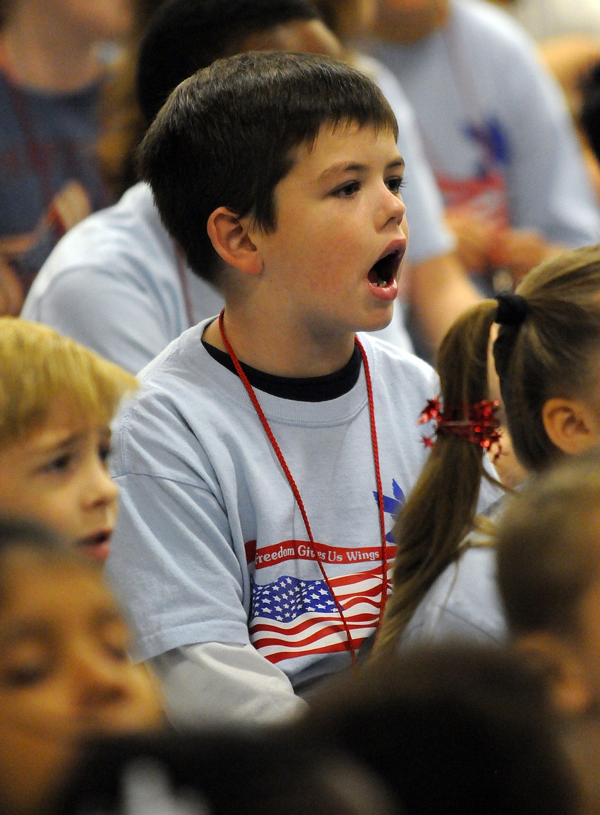 First-grader Mason Reynolds knew all of the words to the Salute to the Flags.