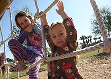 Ella and Mya Brauch had a blast at Bennett Park's grand opening.