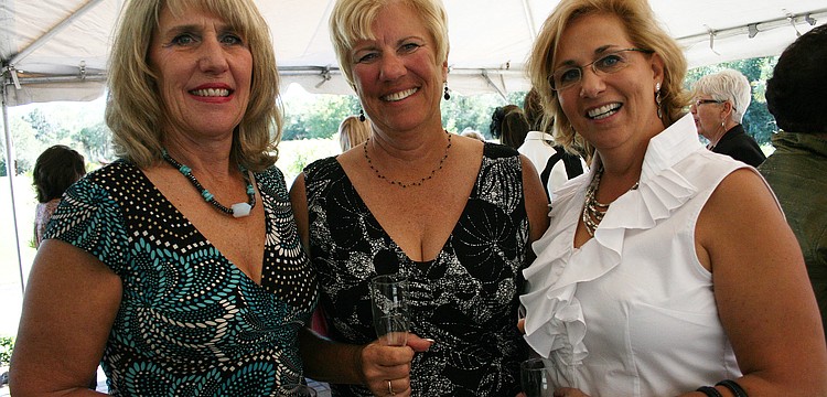 Joanne Pytlik, Caorle Bakalar and June Flaim had a blast at this year's fashion show.