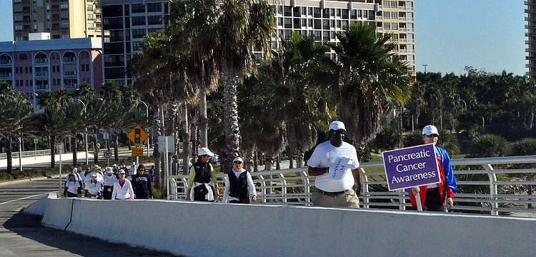 People start to make their way over the Ringling Bridge during the Sarasota Walk.