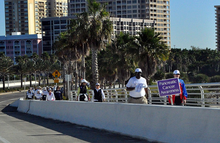 People start to make their way over the Ringling Bridge during the Sarasota Walk.