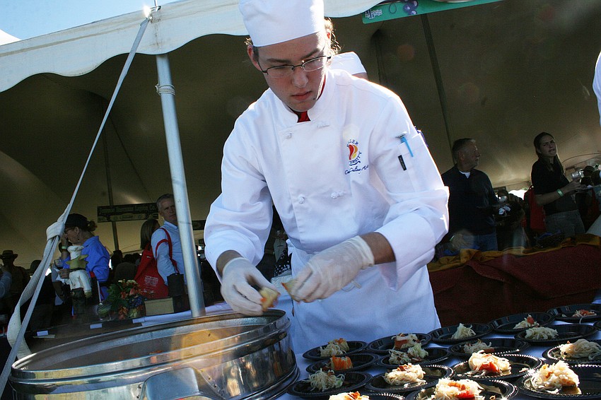 Keiser University culinary student Chris McGroarty prepared siu mai at the school's booth.