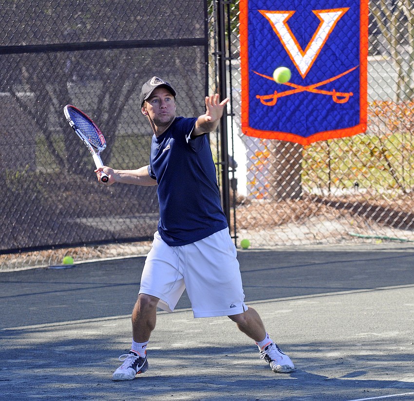 Pepperdineâ€™s Danny Moss returns a serve during his opening round singles match Nov. 11.