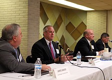 Candidates for the job of Sarasota County administrator answer questions from the audience inside the Potter Building.
