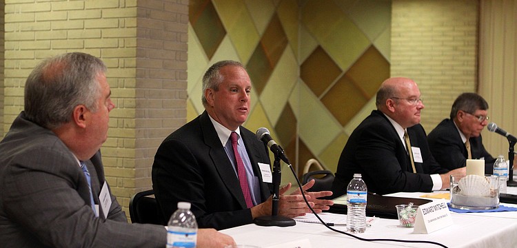 Candidates for the job of Sarasota County administrator answer questions from the audience inside the Potter Building.