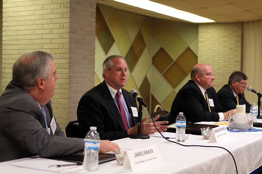 Candidates for the job of Sarasota County administrator answer questions from the audience inside the Potter Building.
