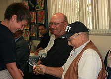 Dylan Davis presenting to his grandfather, Jack Atwater courtesy of Vicki Hosmer.