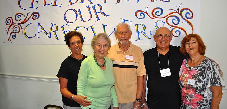 JFCS volunteers Carol Macphee, Esther Heller, Arnold Elliot, Joel Blumsack and Lee Katz helped serve up food, Wednesday, Nov. 16, during the Celebration of Caregivers luncheon at the Harry and Jeanette Weinberg Campus.