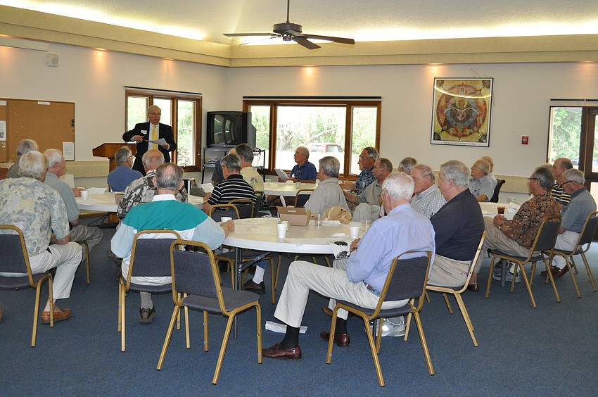 All Angel's by the Sea Men's Group Meeting learn about financial concerns in the current economy