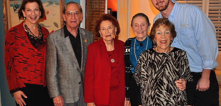 Sue Jacobson, Bert Fivelson, Sarah Elbert, Ursula Pearson, Mimi Edlin and Grant Jones pose together, Friday, Nov. 18, at Edlinâ€™s home at the Sarasota Bay Club.