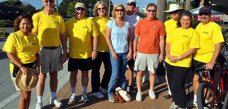 Members of the Siesta Key Association and the Siesta Key Village Association posed together out in front of the Village CafÃ© before heading off to clean up the streets.