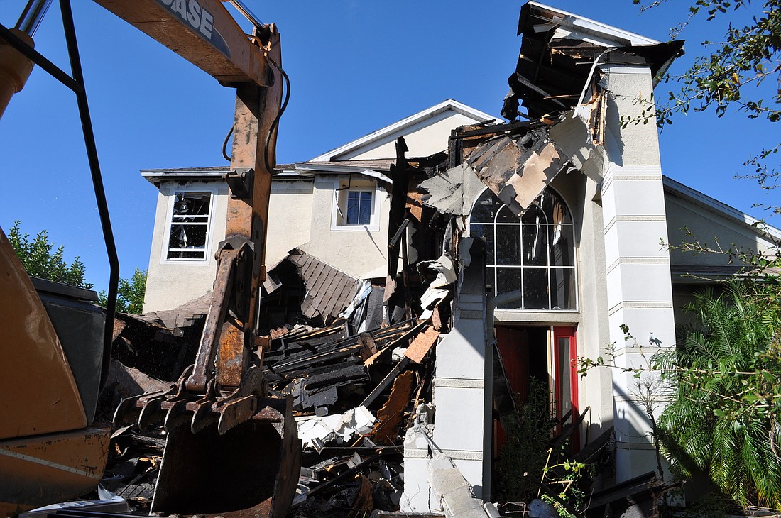 The demolition began around 10 a.m.