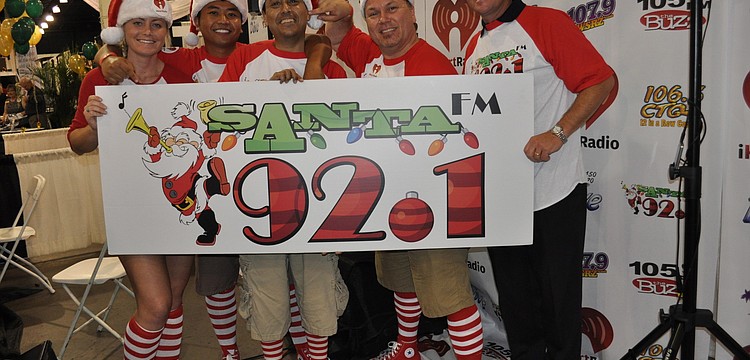 Nikki Clark, Chhun Chhim, J.J. Paone, Charley Halley and Pete Norden with Clear Channel Sarasota