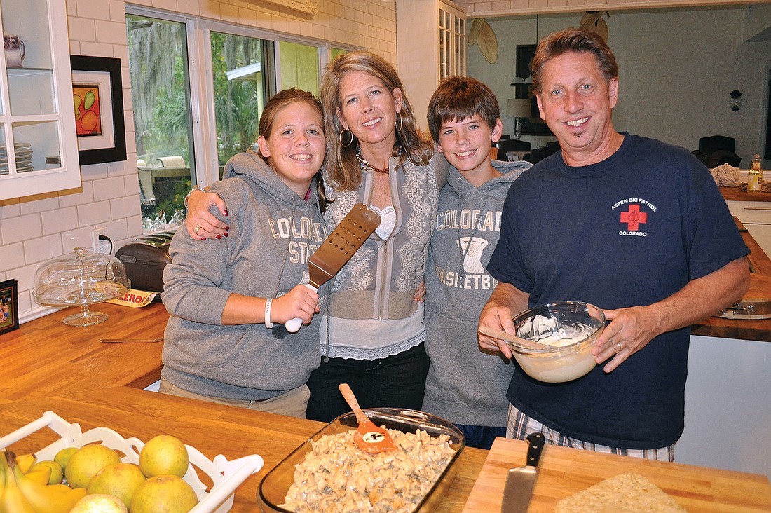 Out-of-Door Academy family Bianca, Roberta, Laszlo and Tom Tengerdy will continue with their Thanksgiving Day tradition of feeding the homeless this year in Colorado while visiting family.