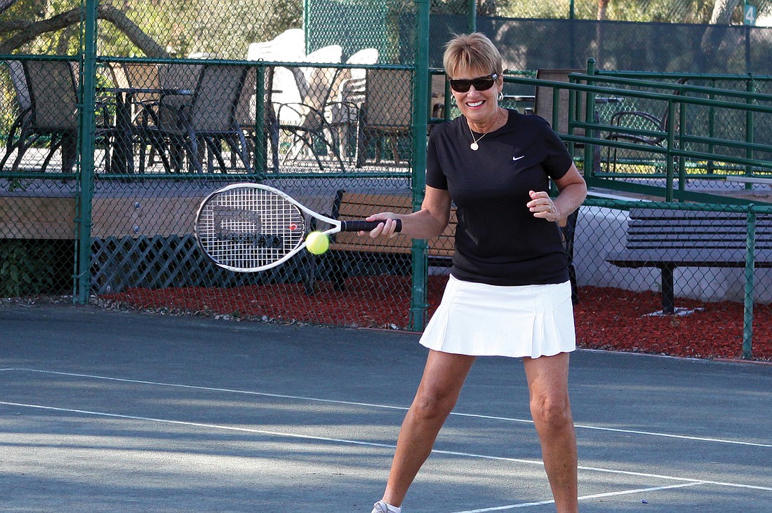 Betty Aden hits the ball during a doubles match in last yearÃ¢â‚¬â„¢s Observer Challenge. File photo.