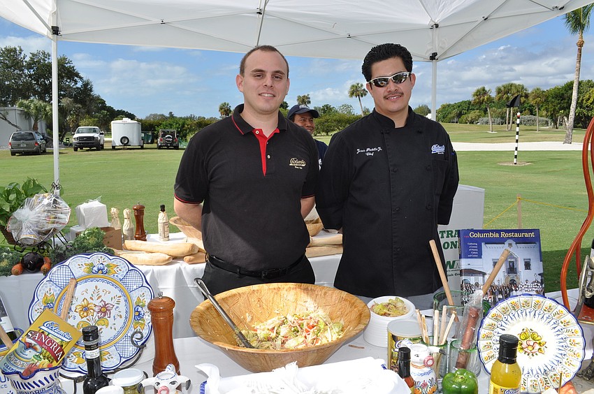Farael Negron and Chef Jesus Padillar at the Columbia Restaurant booth