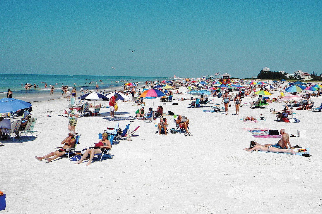 Visitors coming to Sarasota County to see the top beach in the country in 2011 helped push county tourism tax collections to a level not seen in several years. Norman Schimmel.