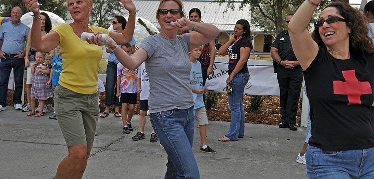 Renee Pitts, Nancy Harrison and Robin Storm put on quite a performance at the video game theater.