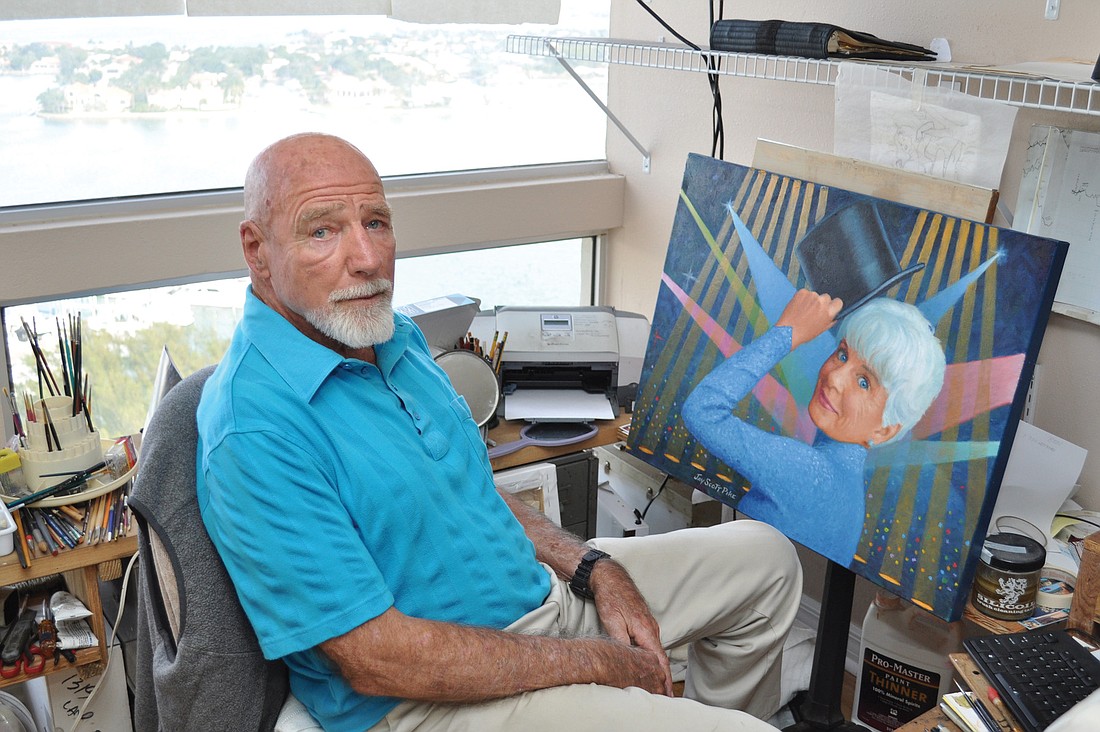 Scott Pike in his apartment studio with one of his newest paintings, one of Plymouth Harbor resident Francie Jones.