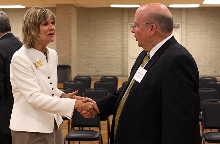 Randall Reid with Mayor Suzanne Atwell. File Photo.